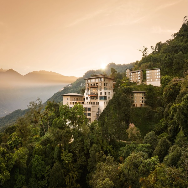 Luxury Sikkim mountain resort nestled amid lush Himalayan forests and scenic valleys, offering an exclusive premium travel experience.