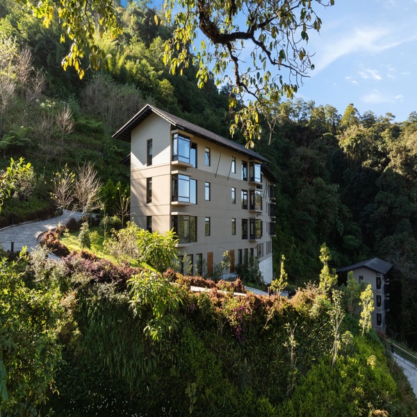 Luxury Sikkim mountain resort nestled amid lush Himalayan forests and scenic valleys, offering an exclusive premium travel experience.